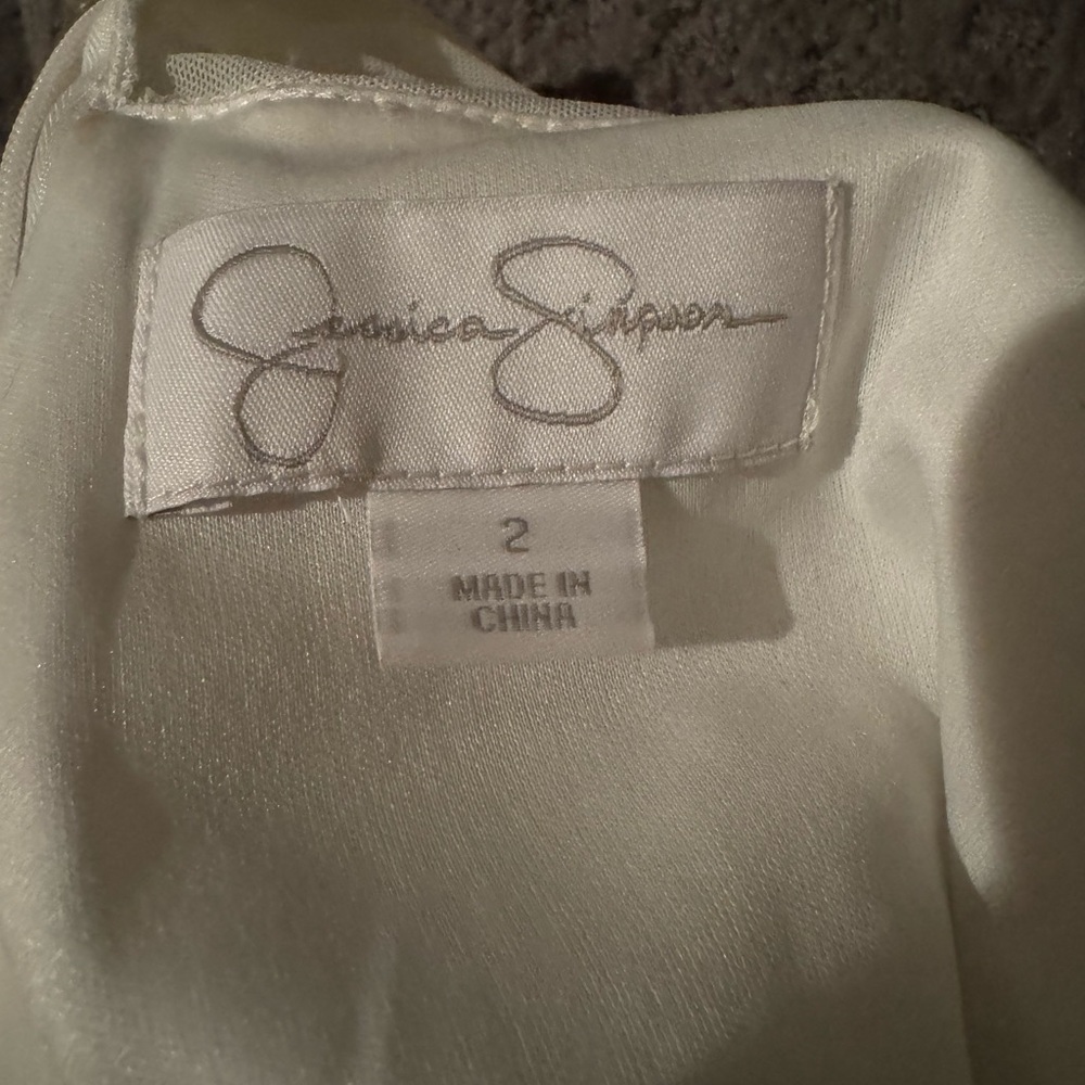Lovely Jessica Simpson Designer dress, white and black, size 2.